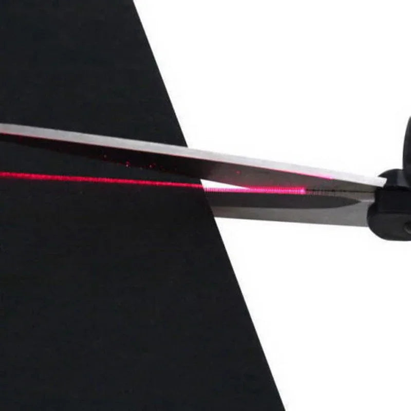 Close-up of a sword with a red blade on a black and white background